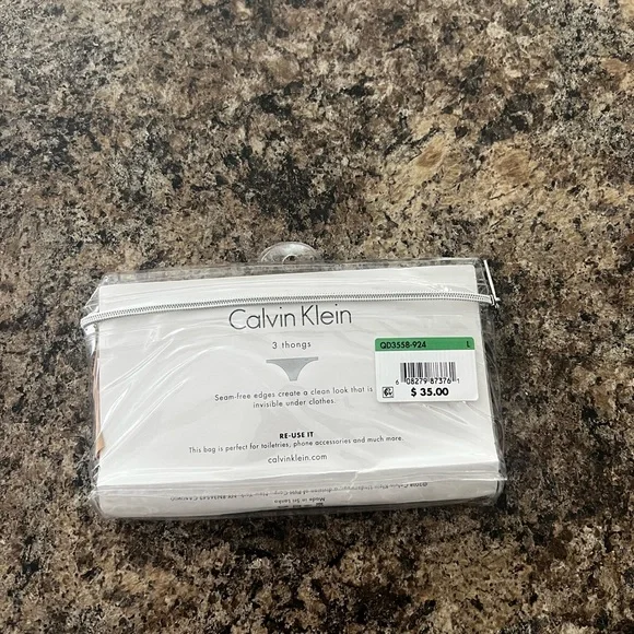 Calvin Klein Women's Invisibles Thong 3 pack - Picture 5 of 5